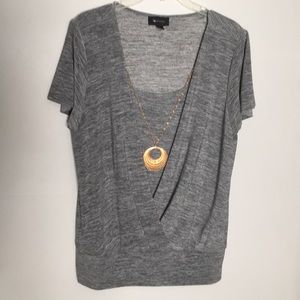 Dark Gray Blouse With Gold Necklace.